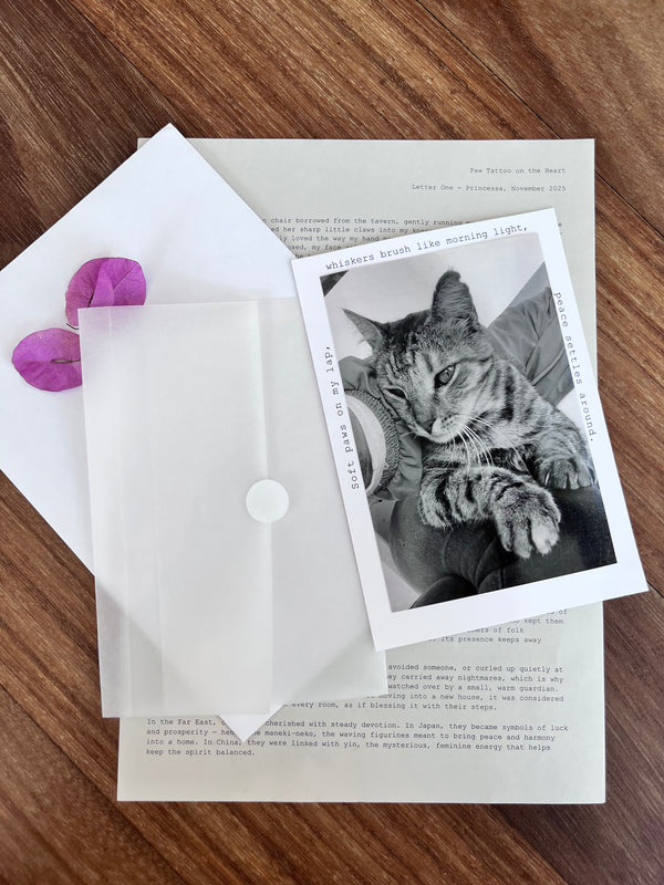 paw tattoo on the heart